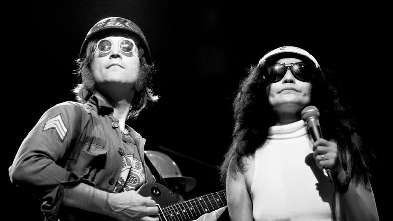 Power to the People: John & Yoko Live in NYC Backdrop Image